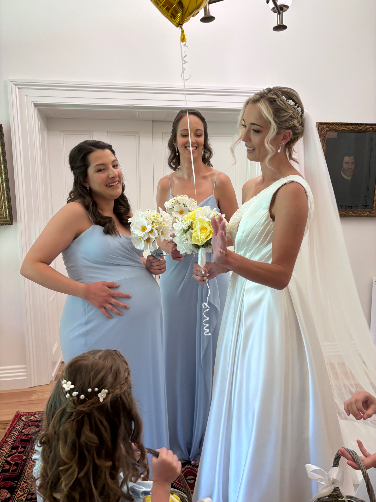 Bride with pale blue bridesmaids and flower girl during getting-ready portrait, altered by Jacqui