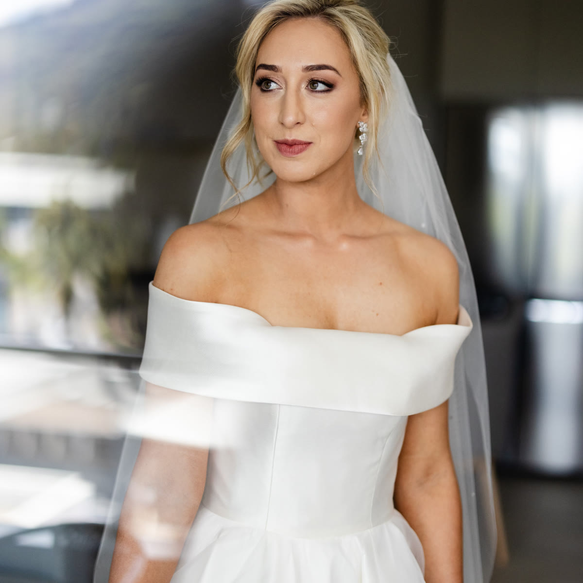 Bride in off-shoulder satin wedding gown with veil — bespoke gown fitting by Alterations by Jacqui NSW